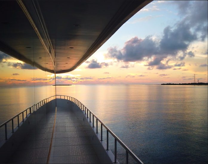 View from a yacht deck at sunset